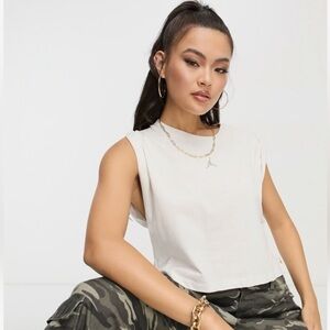 Jordan White crop dri-fit- loose fit Top. NWT